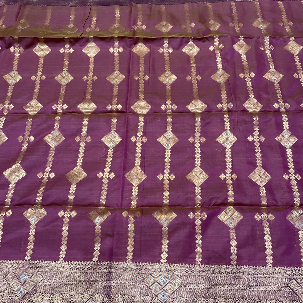 Luxurious Purple & Gold Woven saree